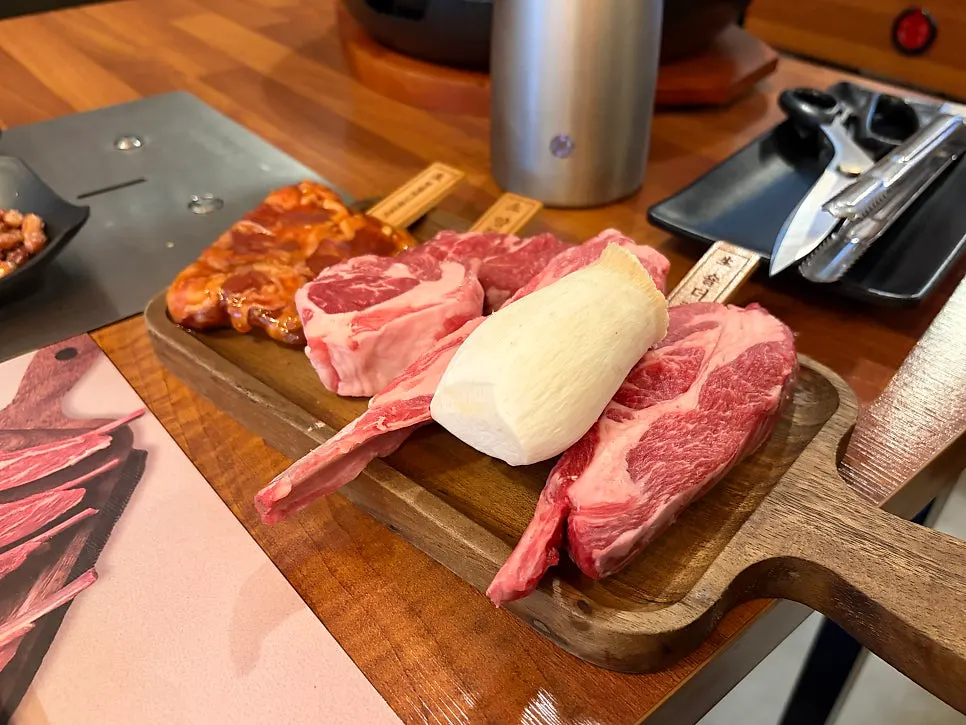 Lamb ribs placed on the charcoal grill