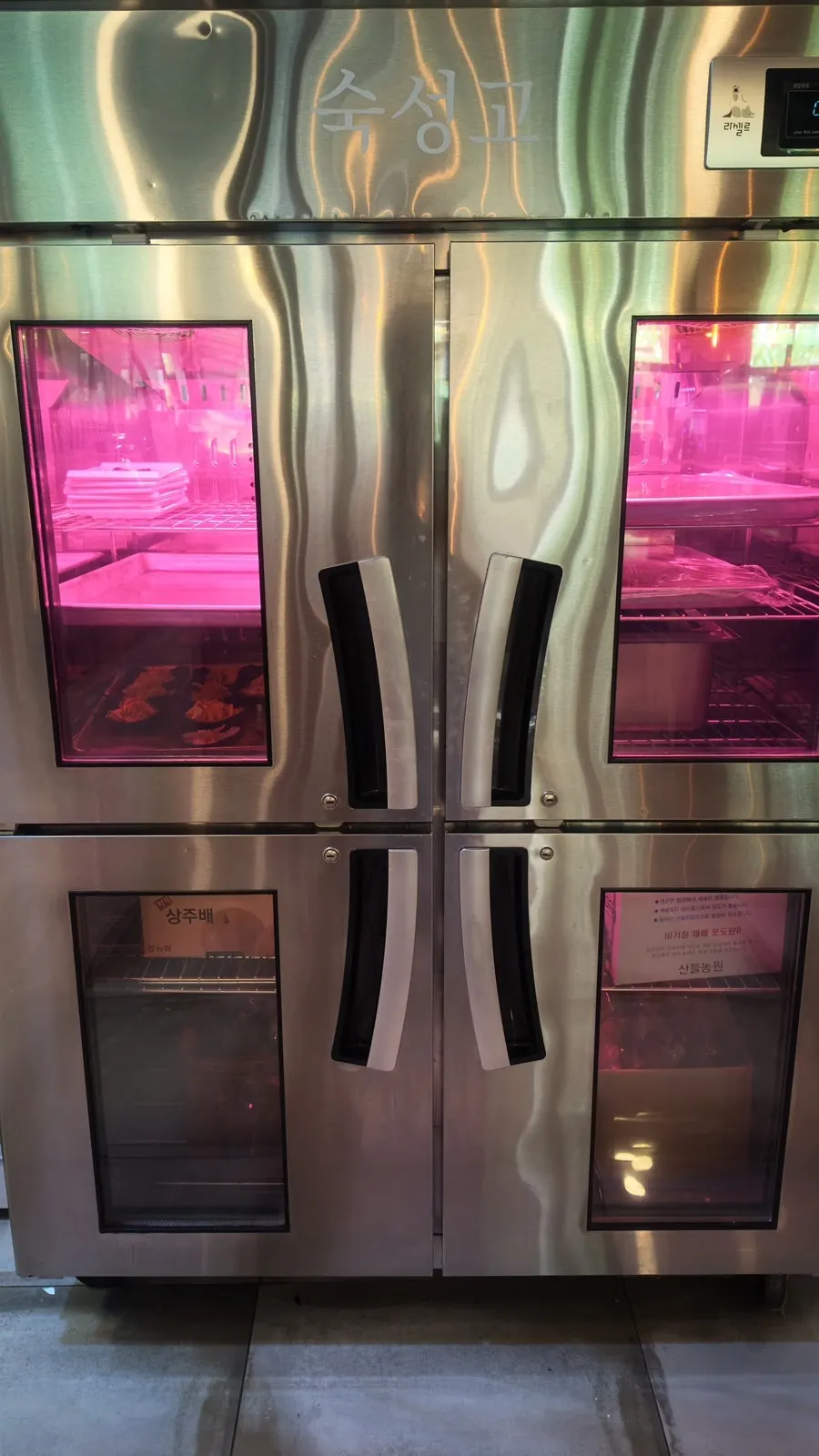 Lamb aging fridge at the store entrance