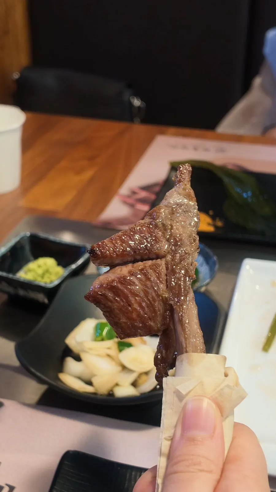 Grilled lamb paired with the banchan spread