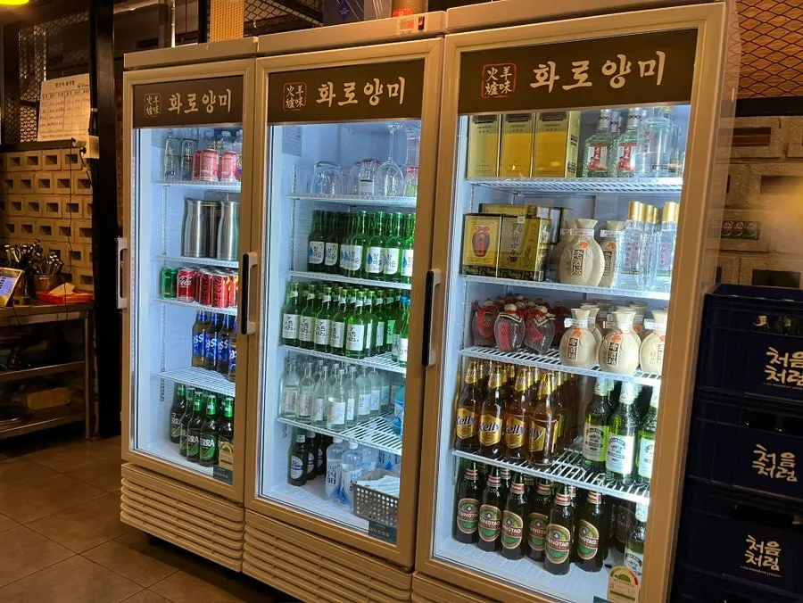 Three drink fridges lined up in the restaurant