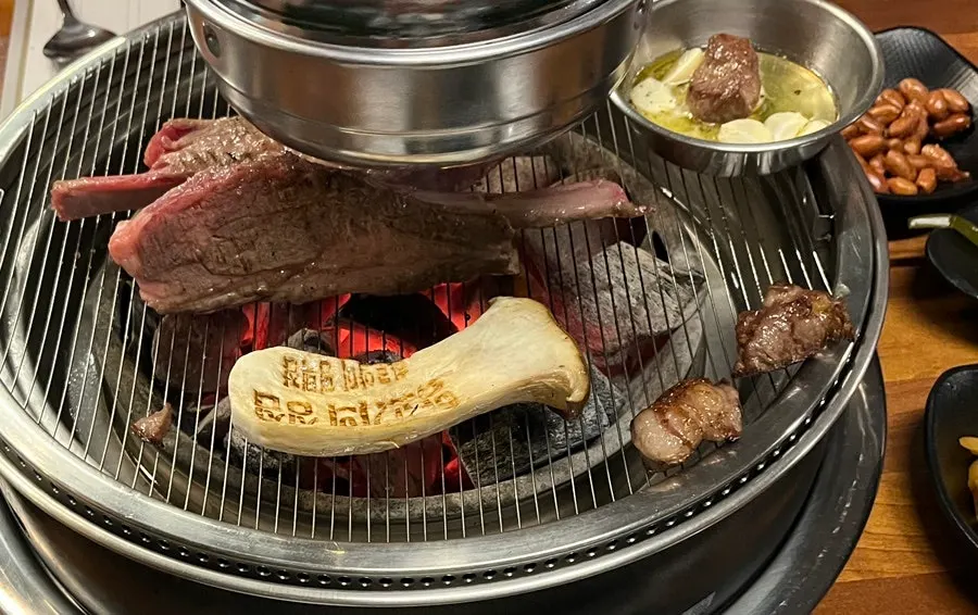 Lamb grilling to medium over the charcoal fire