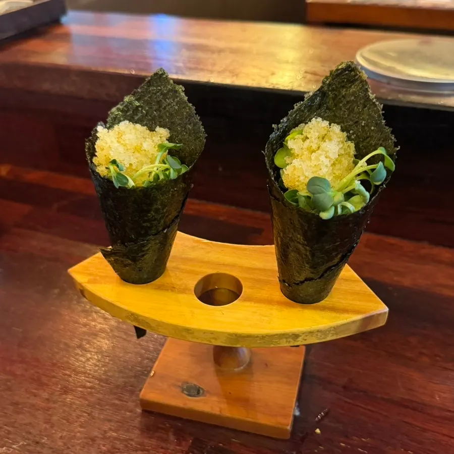 Flying fish roe maki and mini buckwheat noodles served at the end of the course
