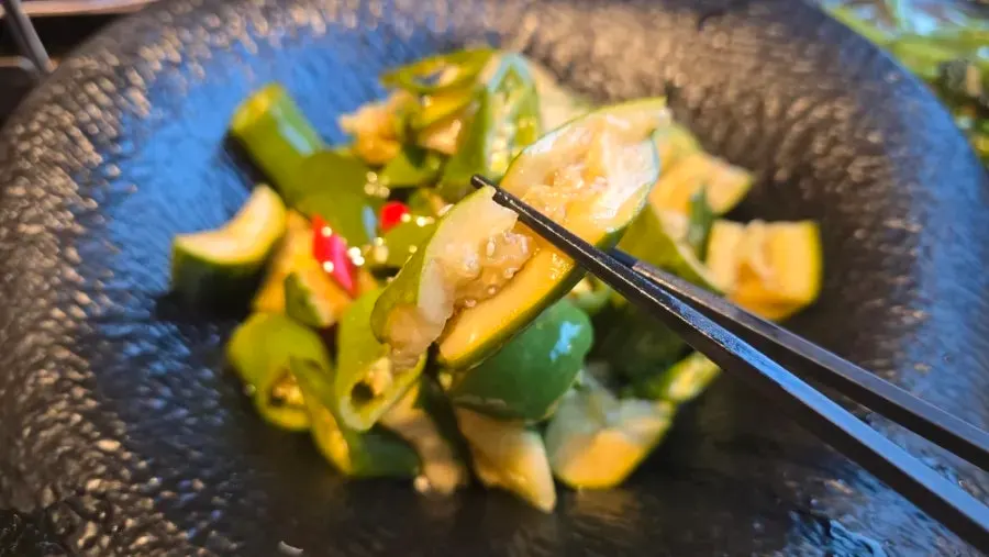 A chunky piece of smashed cucumber