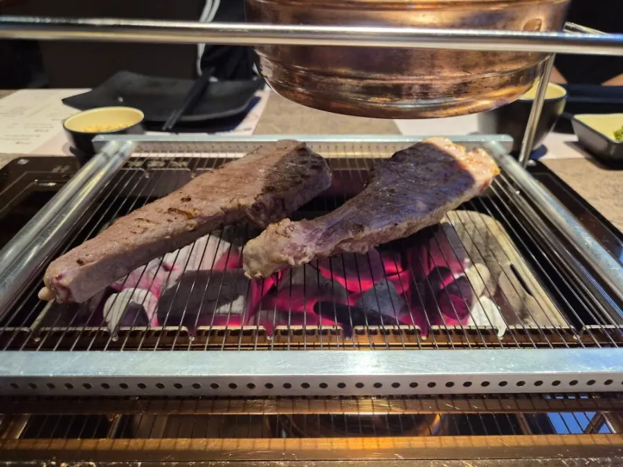 French rack on the charcoal grill