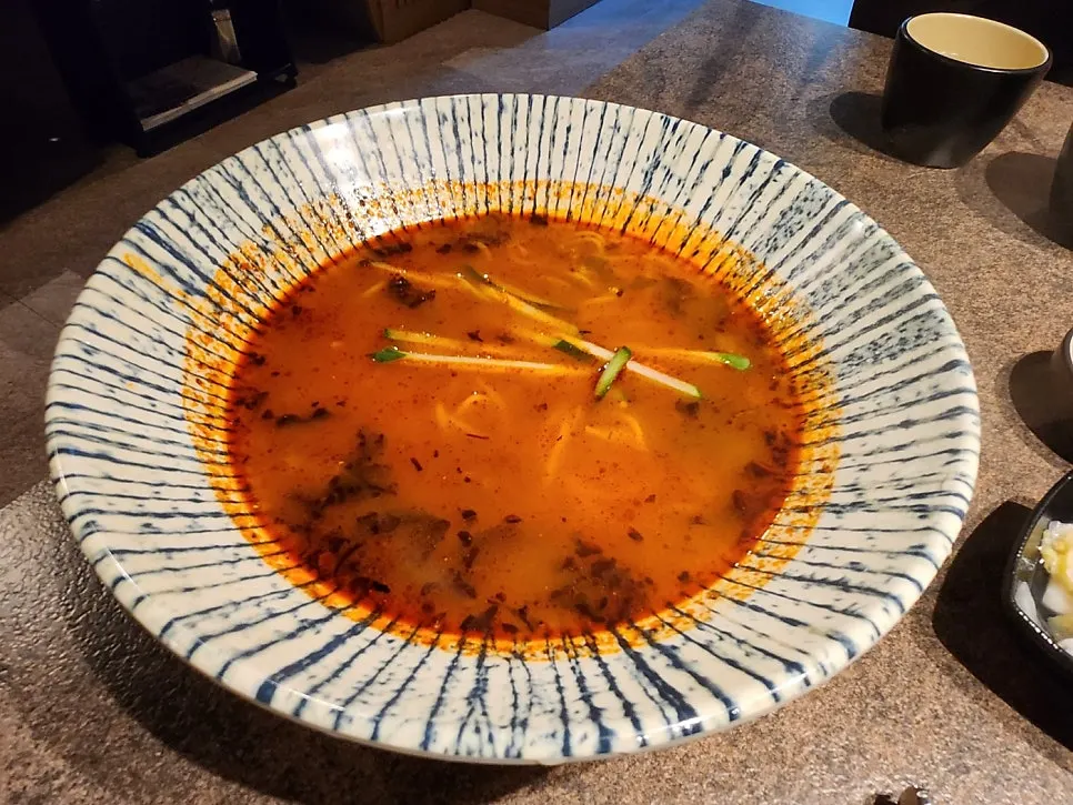 Table set with Hwarodam's noodle soup