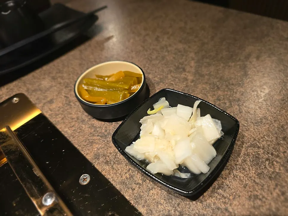 Neatly arranged side dishes and sauces