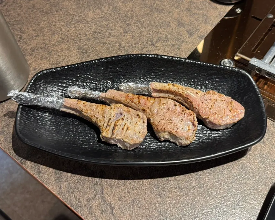 Three pre-seared pieces of lamb French rack