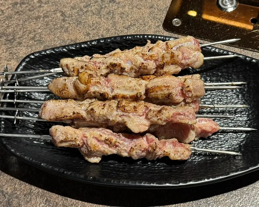 Eight pre-seared lamb rib-meat skewers