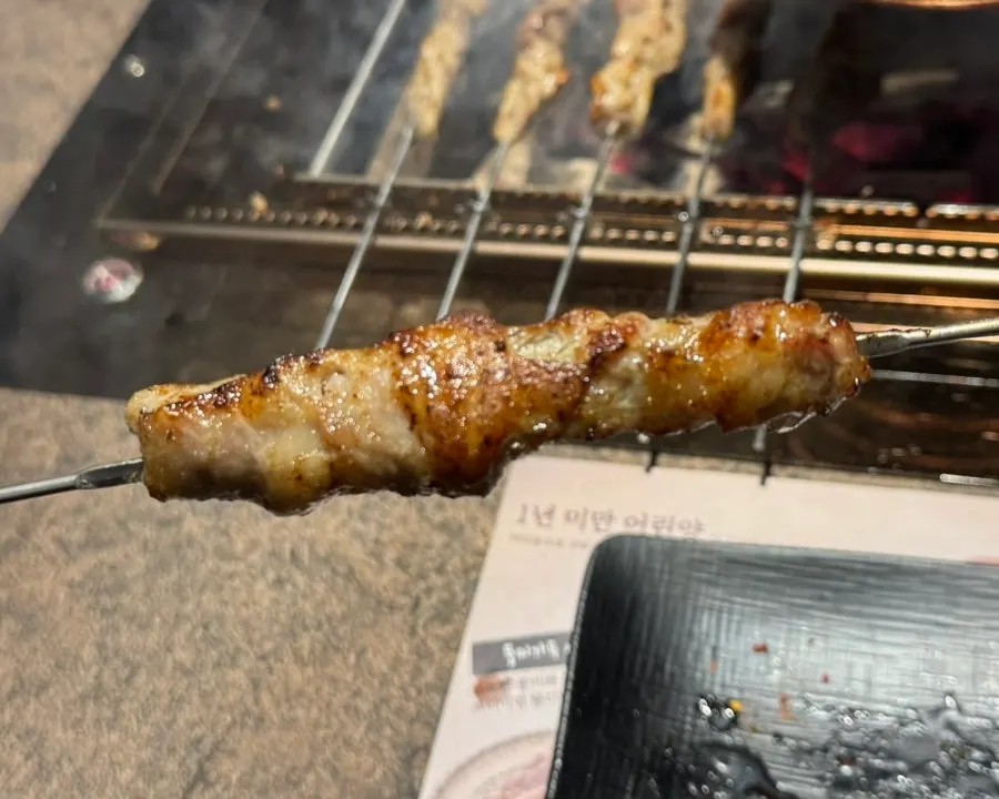 Rib-meat skewers cooking on the rotisserie