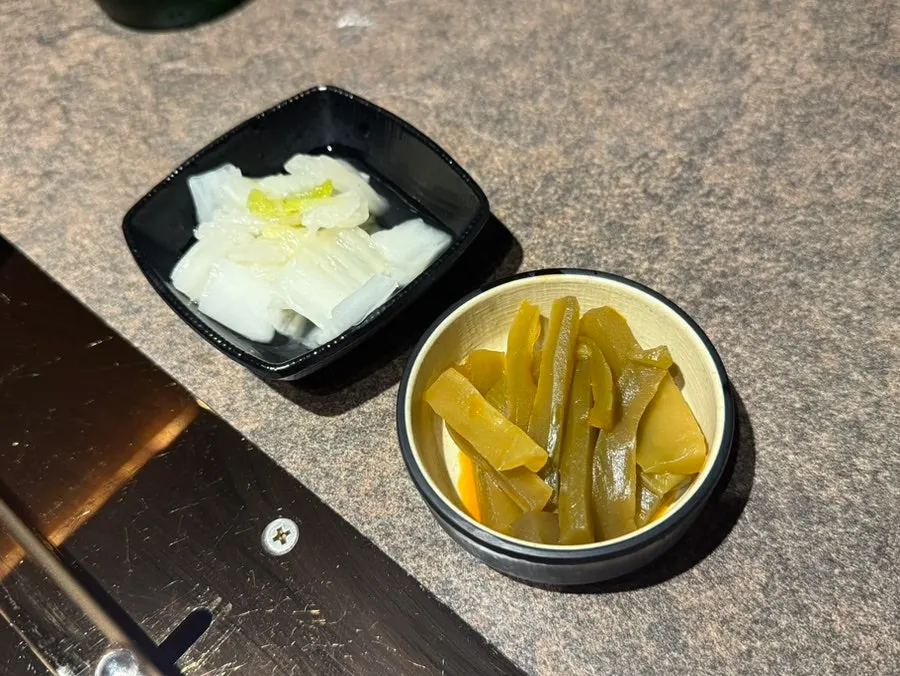 Three types of dipping sauce served with the lamb chops