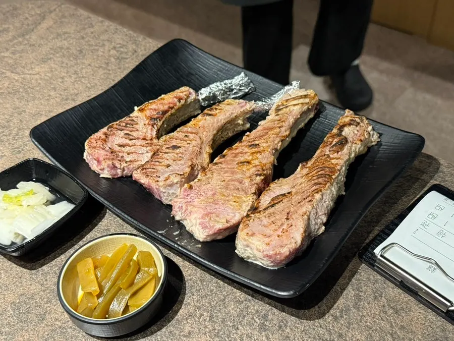 Charcoal grill setup with pre-seared lamb chops