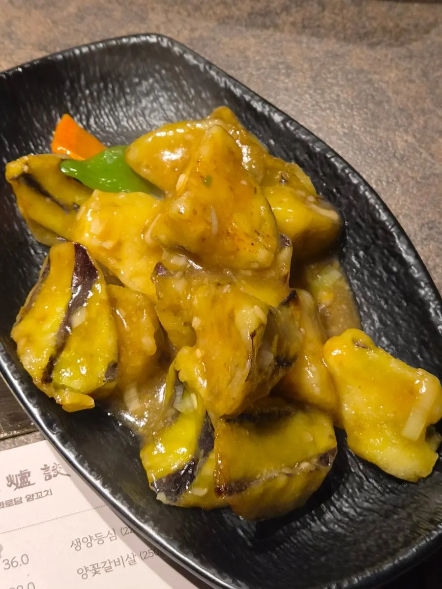 A plate of savory eggplant fritters
