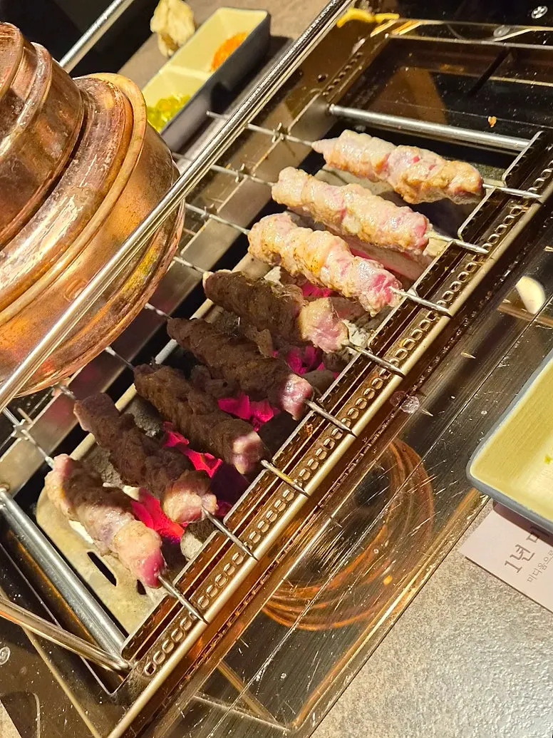 Medium-size guo bao rou coated in sweet and sour sauce