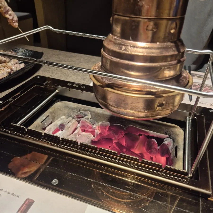 Charcoal grill placed on the table