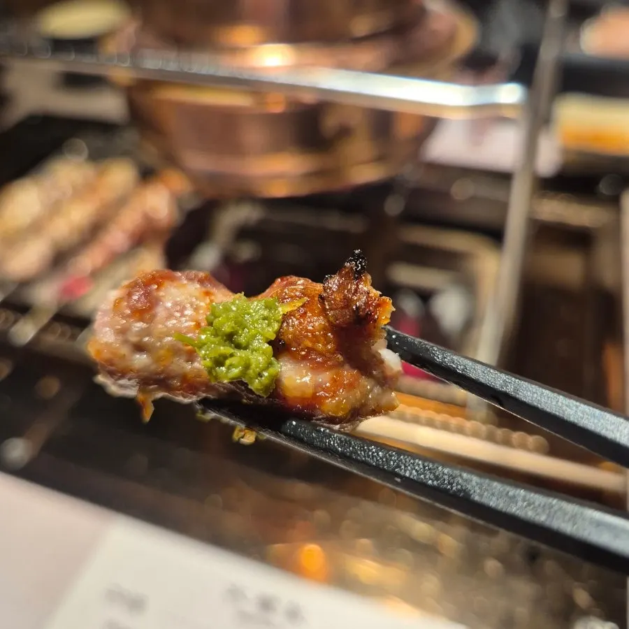 Lamb dipped into the special sauce