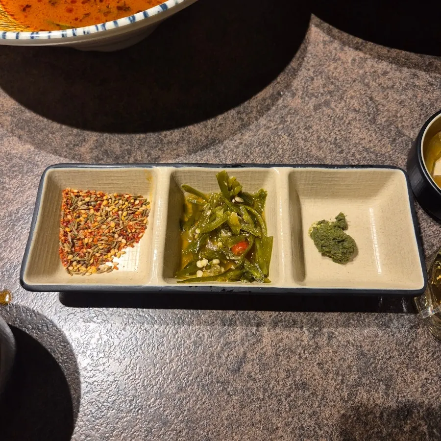 Lamb skewers served with side dishes