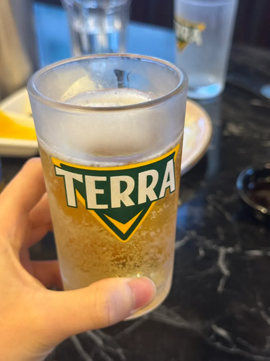 Cold beer ordered alongside fried dumplings