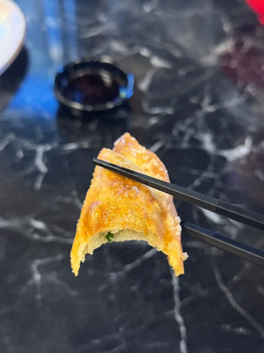 Table with fried dumplings paired with beer