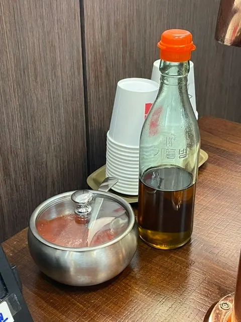 Gochujang and sesame oil on the table
