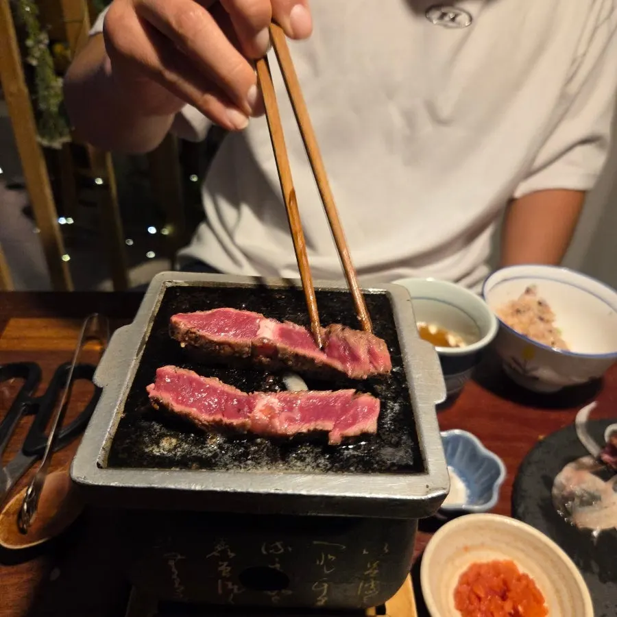 Child eating the grilled steak