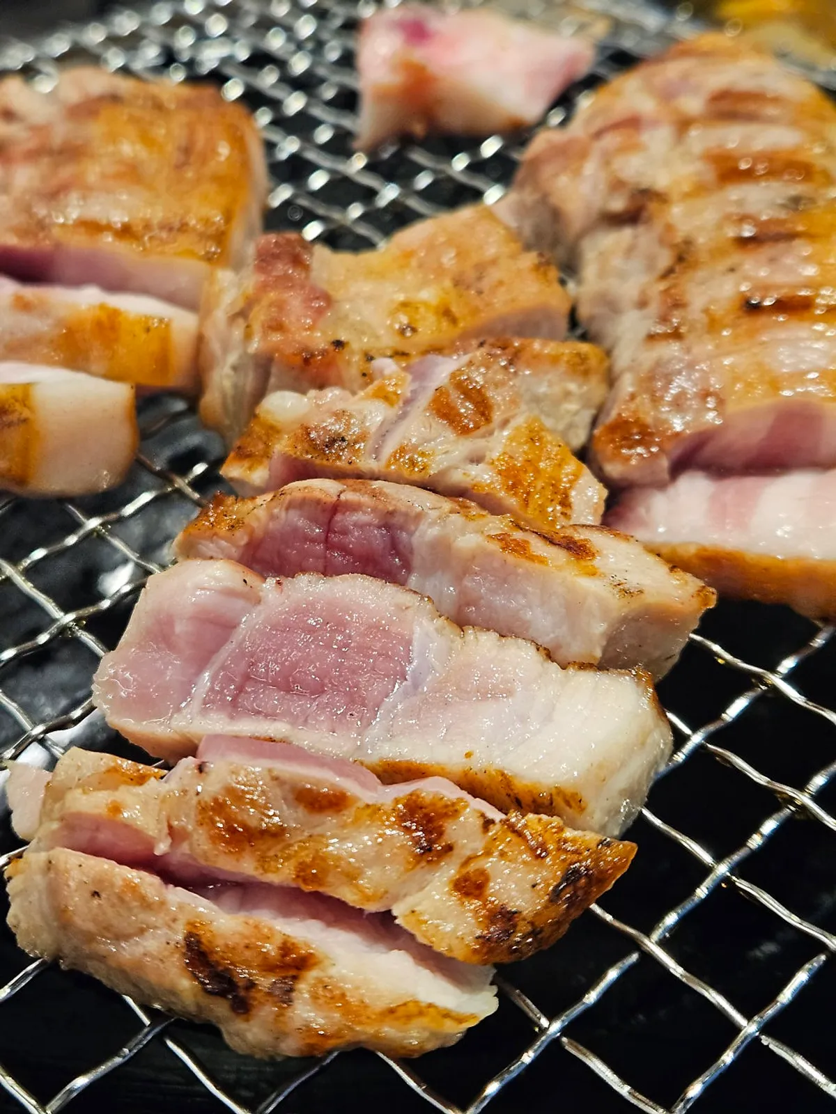 Close-up of pork belly packs chosen from the showcase