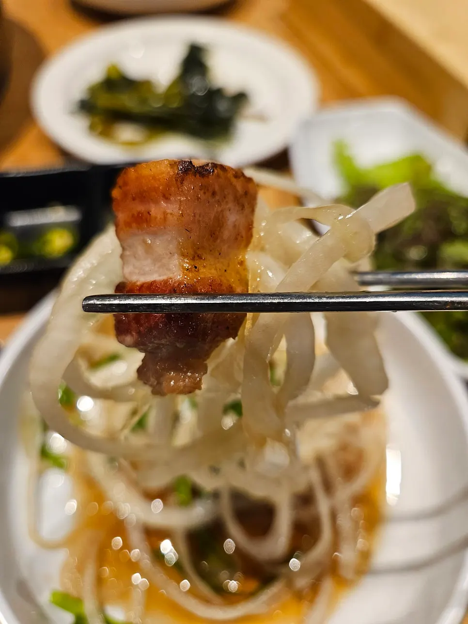 Pork belly wrapped in mountain garlic leaves
