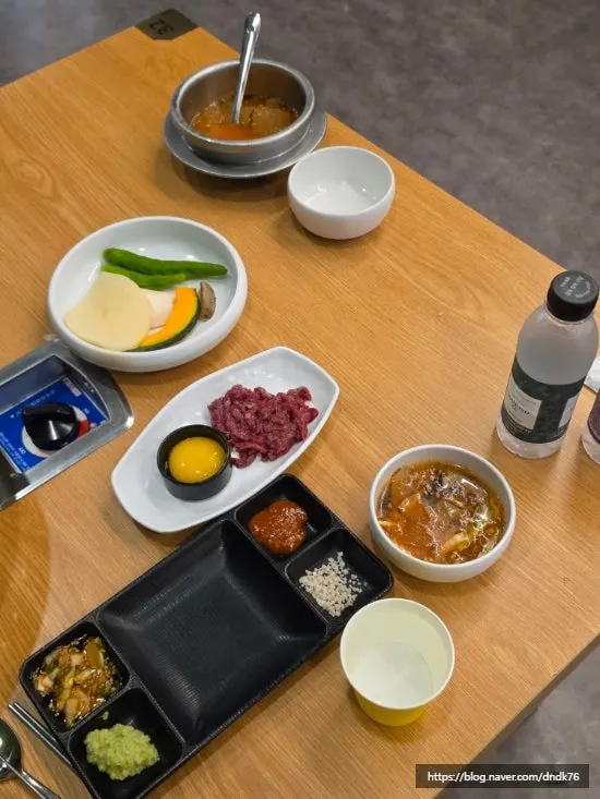 Full table topped with dishes from the self-bar