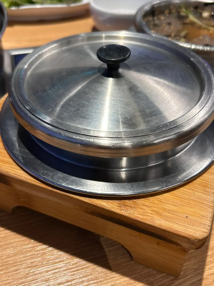 A bite-sized piece of cut meat