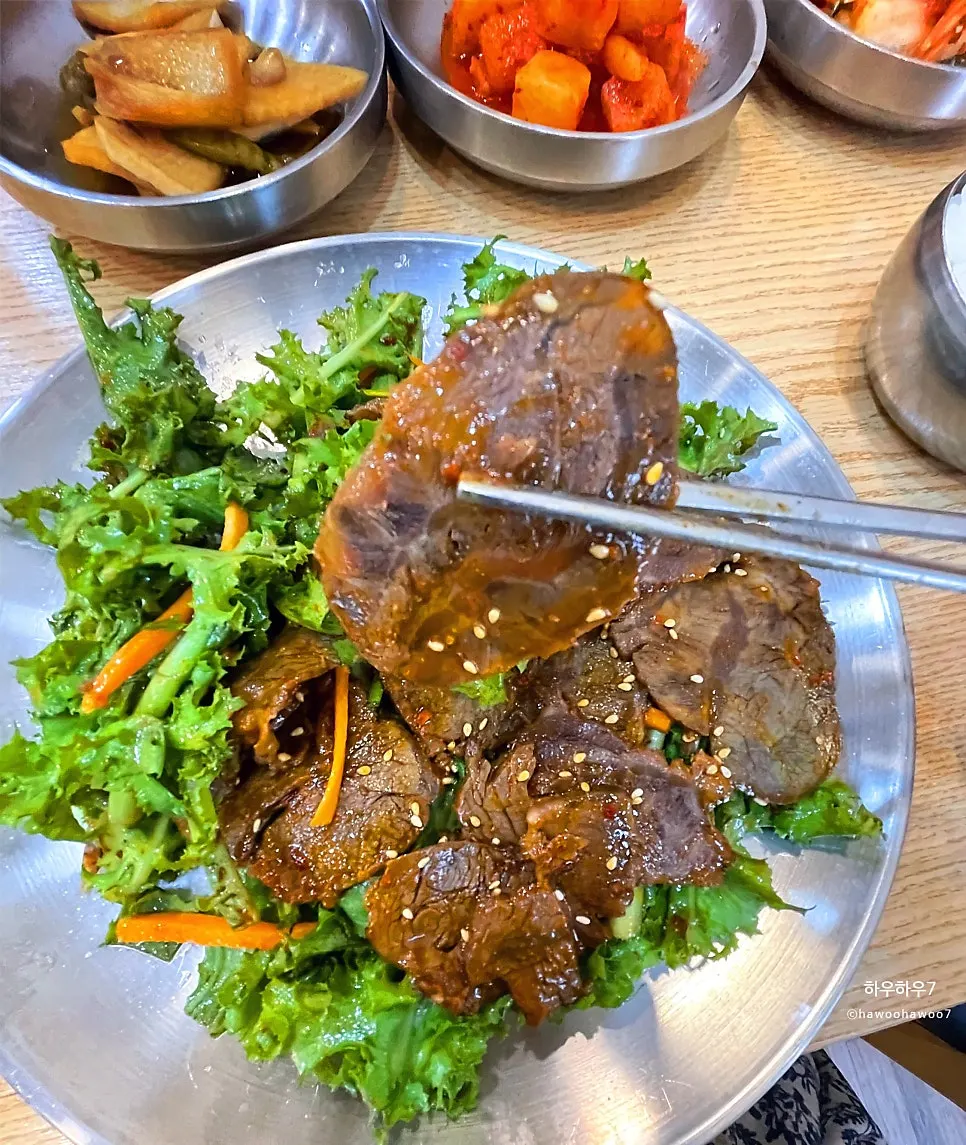 Close-up of chive salad tossed in gochujang sauce