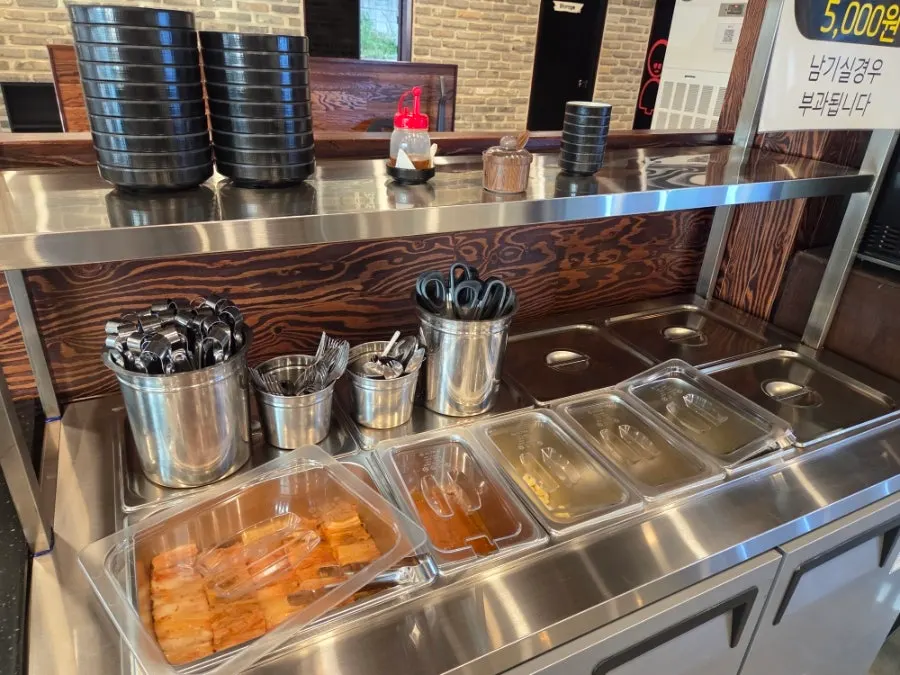 The dedicated meat-aging fridge on one side of the restaurant