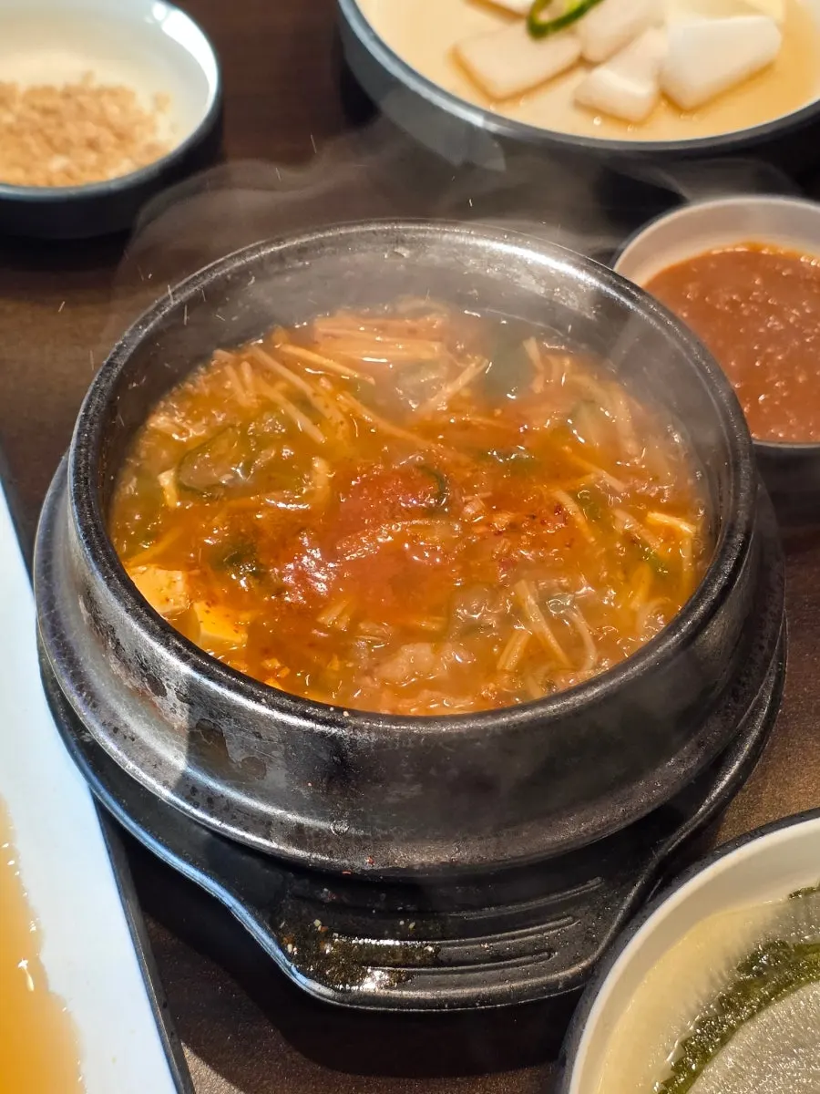 Chadol doenjang jjigae served bubbling in a stone pot