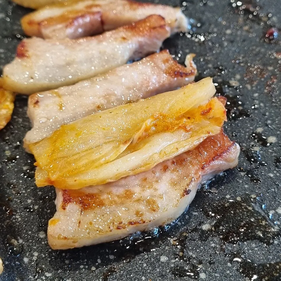 Pork jowl grilled over wood fire