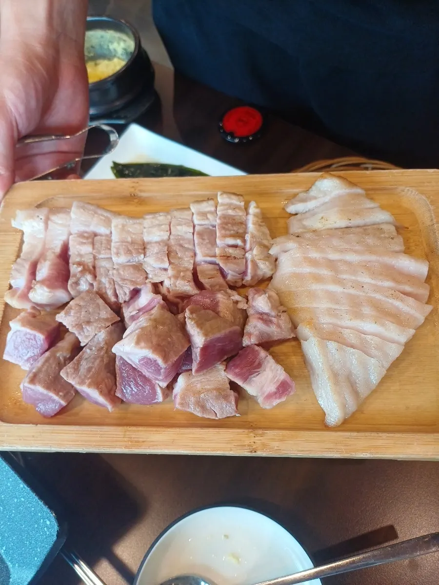 Pork platter pre-seared over oak charcoal