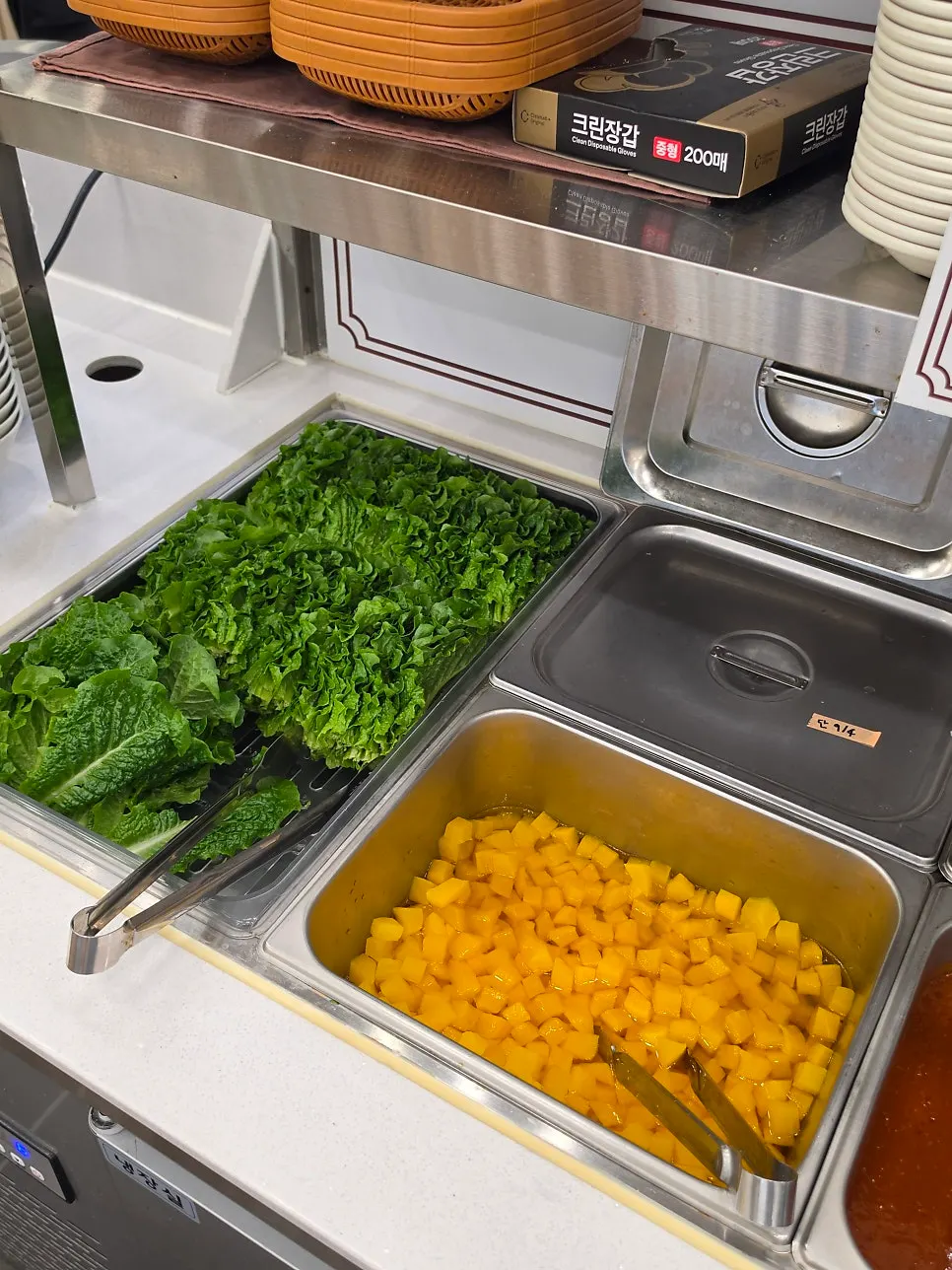 Side dishes and sauces on the salad bar