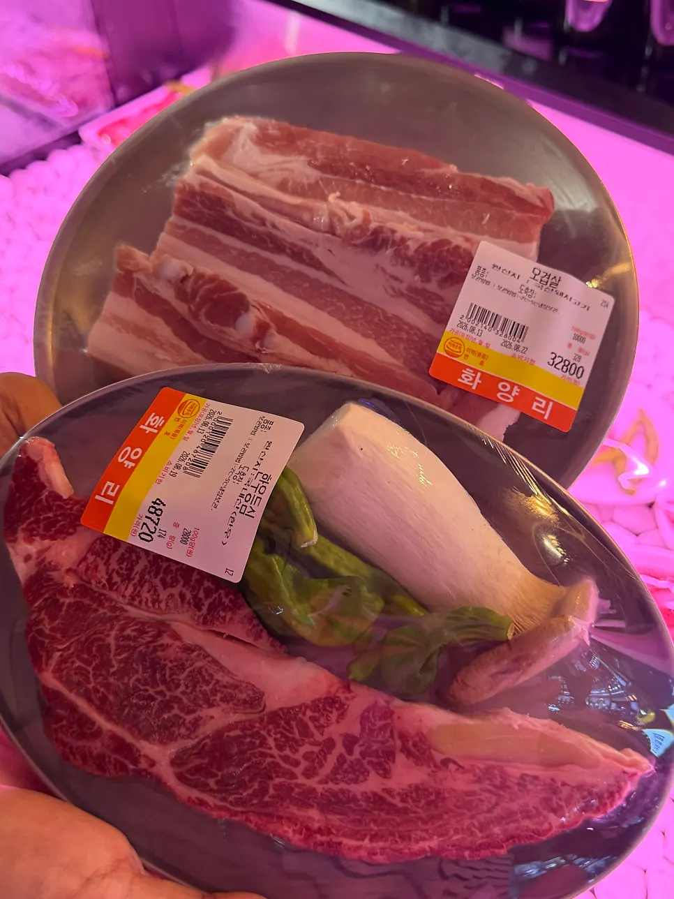 Korean beef sirloin and pork belly plated together