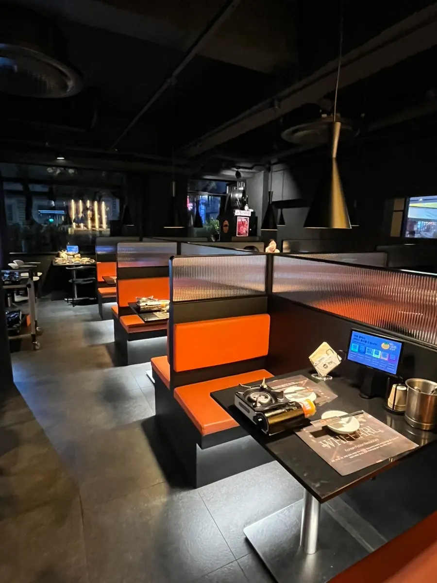 Partitioned seats with table lighting at Hwieol Migeum Branch