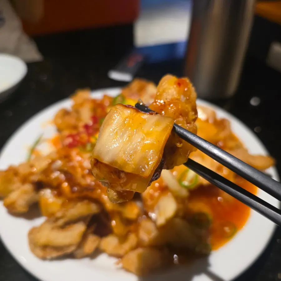 Close-up of stir-fried kimchi on top of the tangsuyuk
