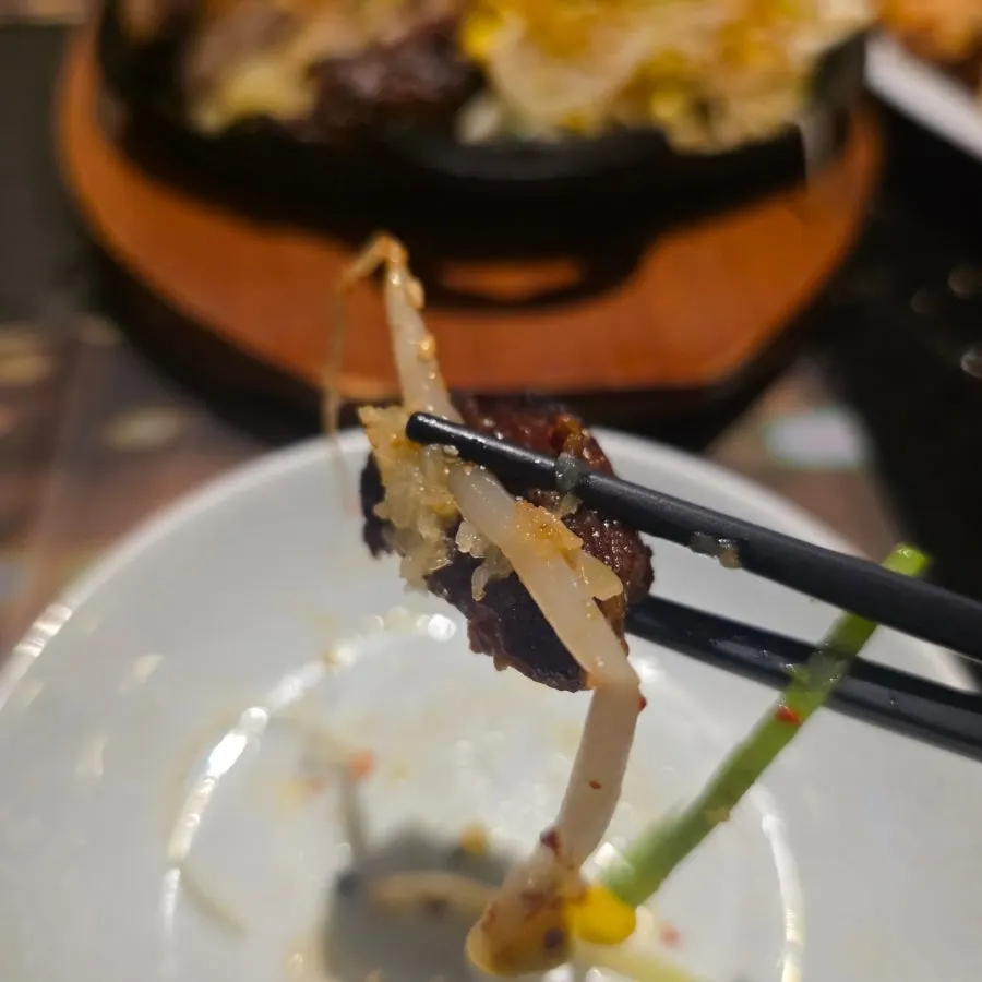 Close-up of the garlic-scented bossam