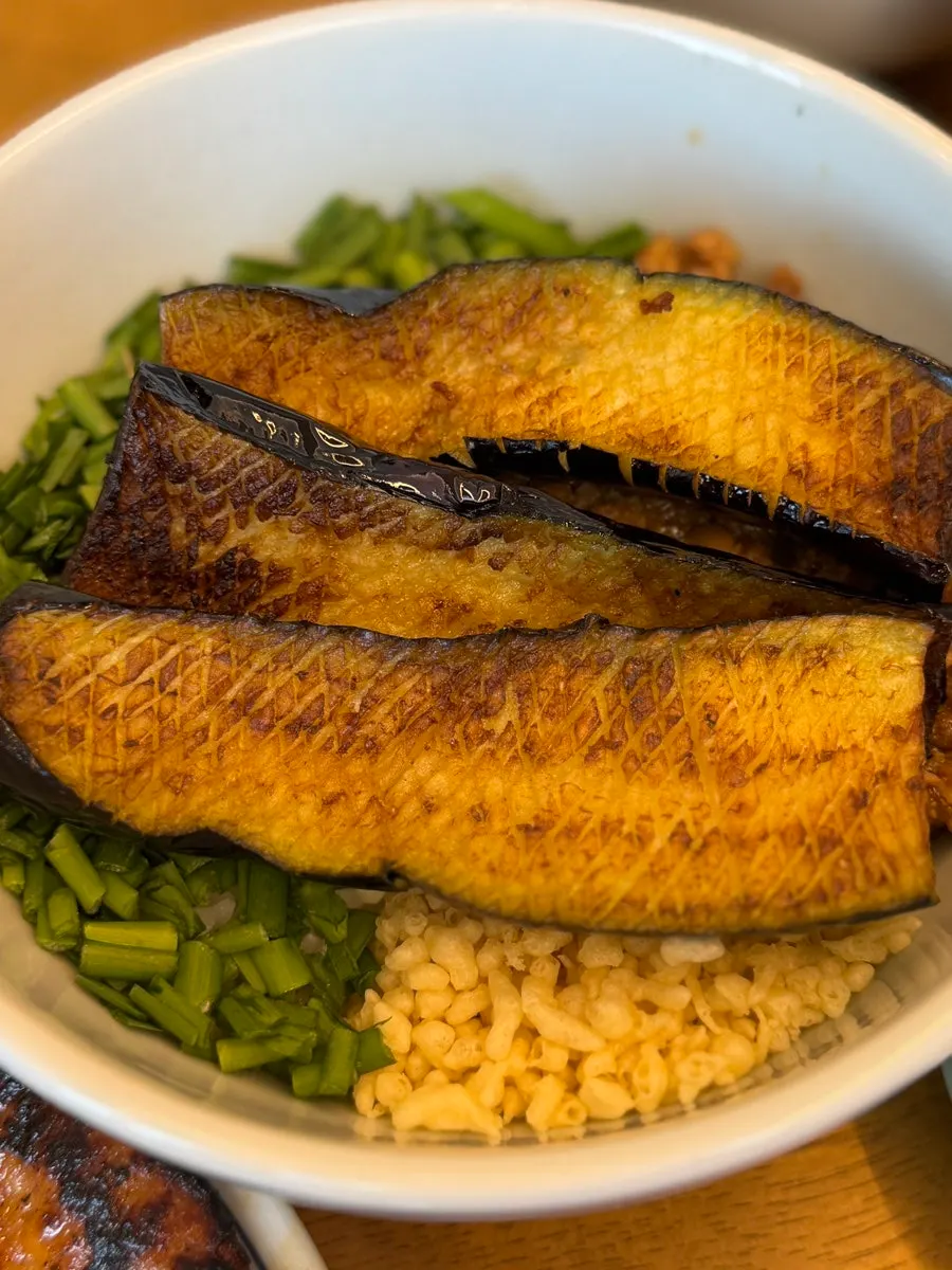 Gondre rice wrapped in gopchang gim with bibim jeotgal on top
