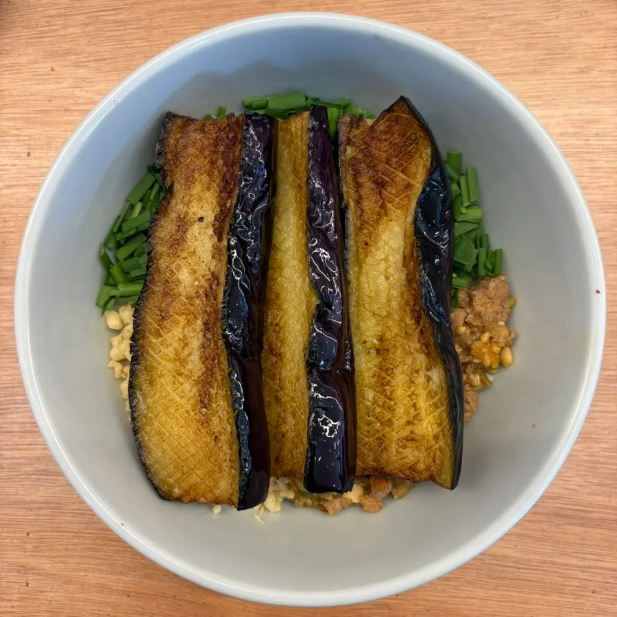 A spoonful of mixed eggplant doenjang rice bowl