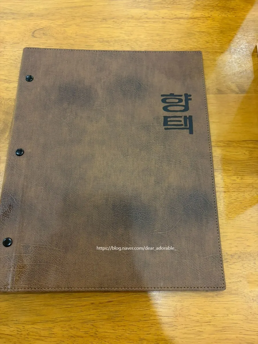 Photos of new menu items on the wall