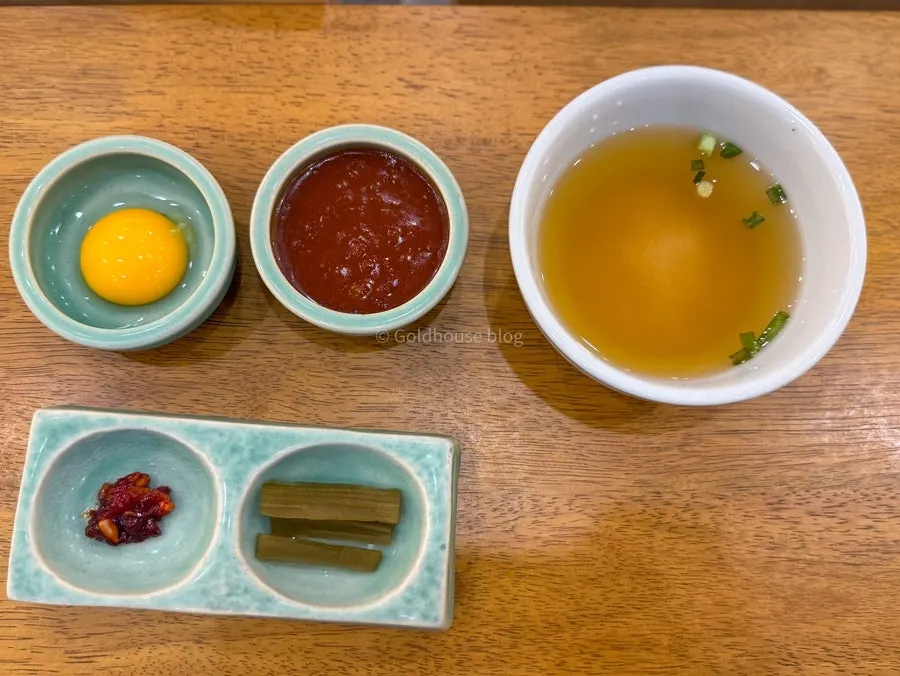 Basic table setting for mackerel gondre rice and yukhoe bibimbap at Hyangtaek