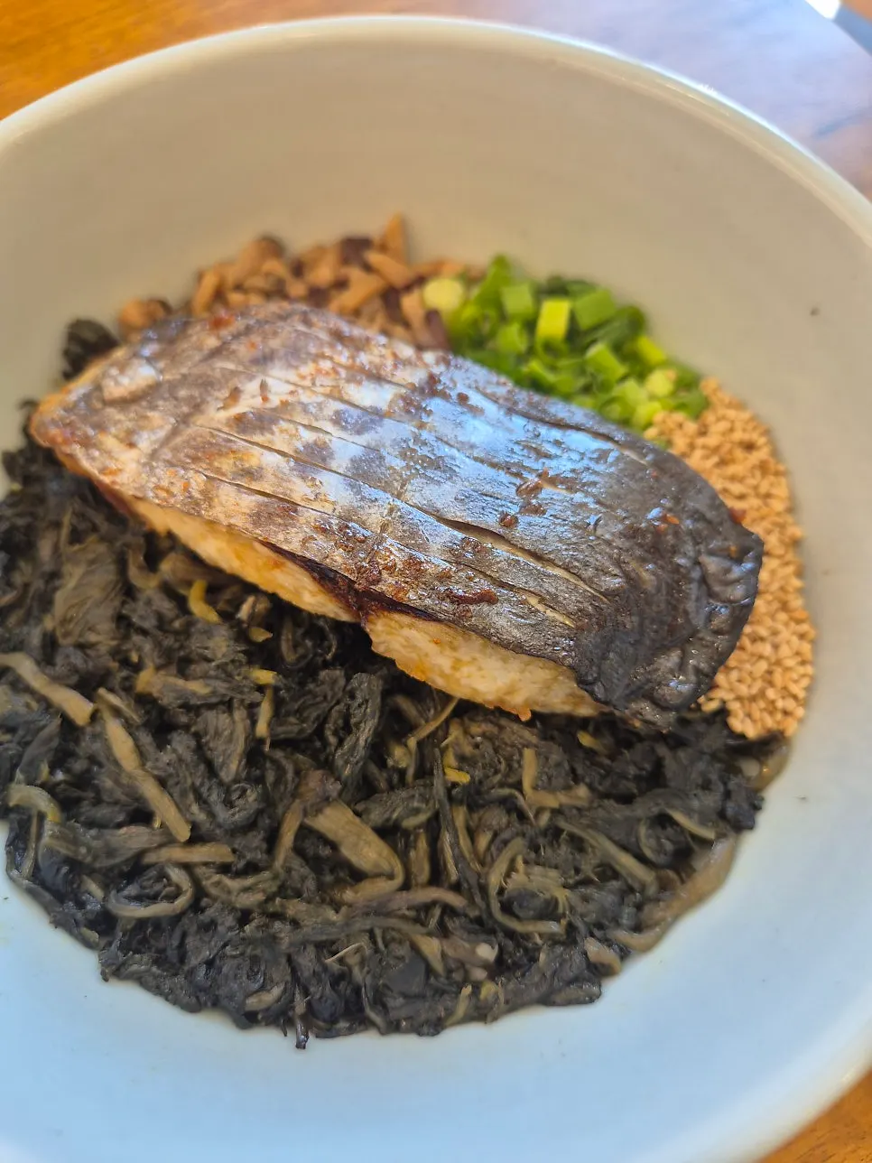 Table setting of gondeure rice served with mackerel