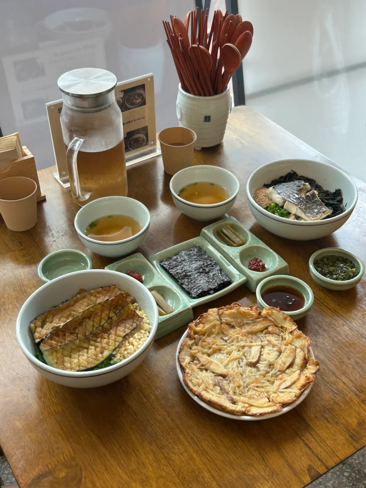 Table set with mackerel gondre rice and eggplant doenjang rice bowl
