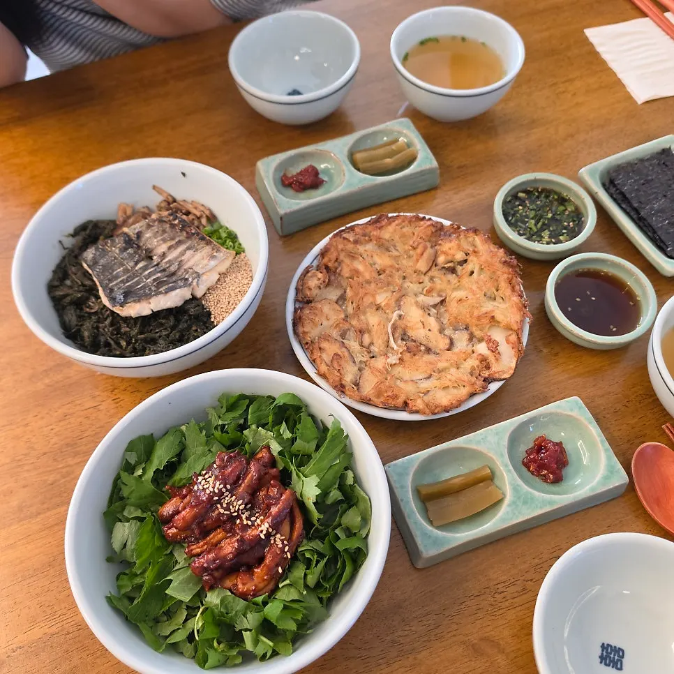 Neat table spread with basic side dishes and mains