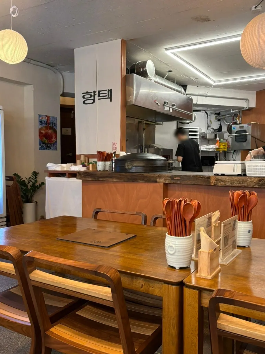 Wood-toned interior of Hyangtaek Daebong Branch