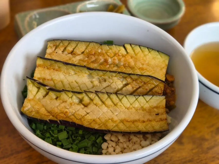 Eggplant doenjang rice bowl topped with grilled eggplant