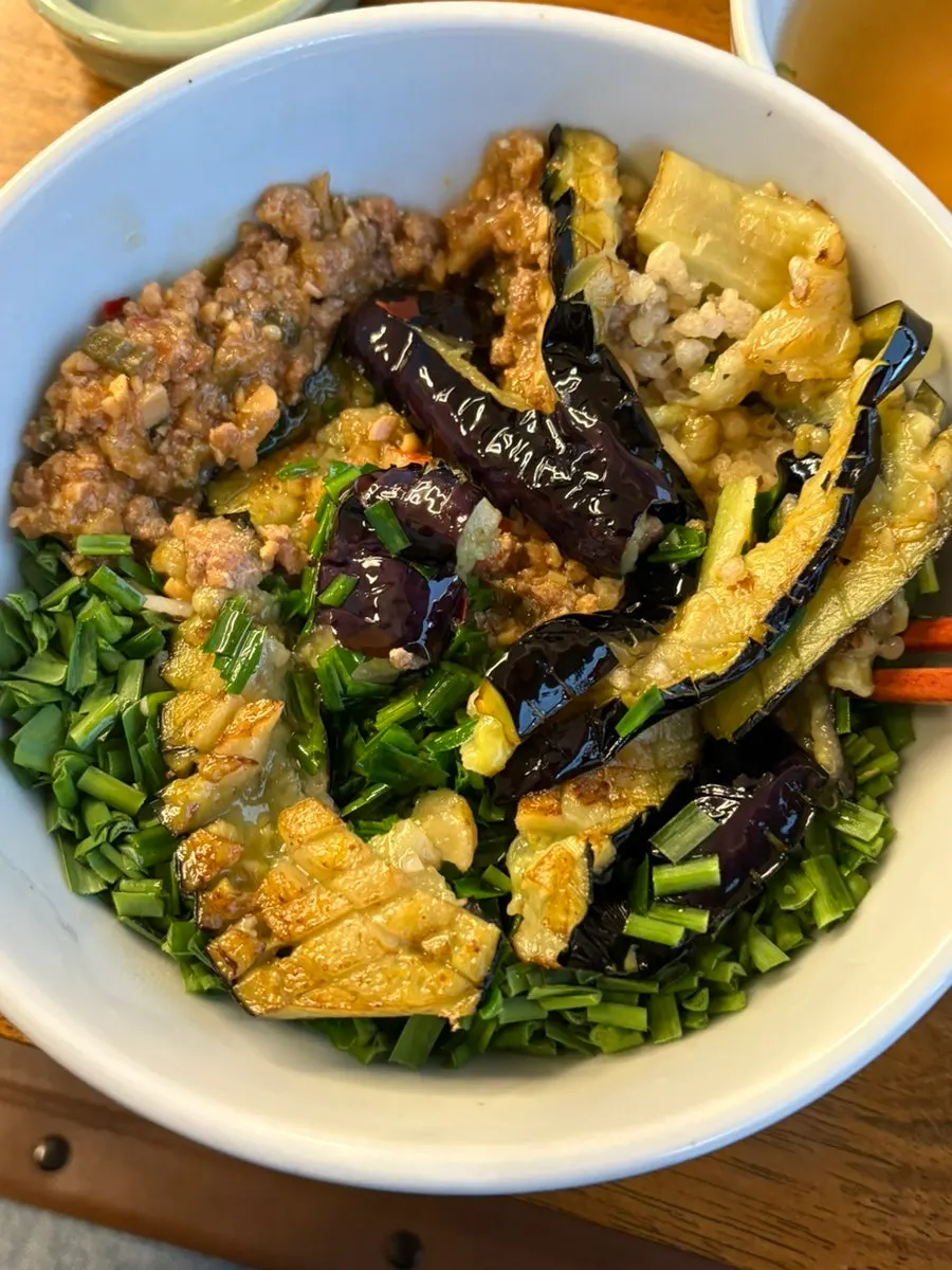 Eggplant doenjang rice bowl mixed with ssamjang and chives