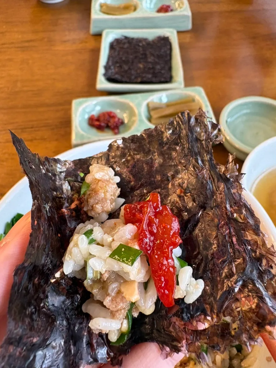 A meal for two with rice bowl and bibim noodles served together