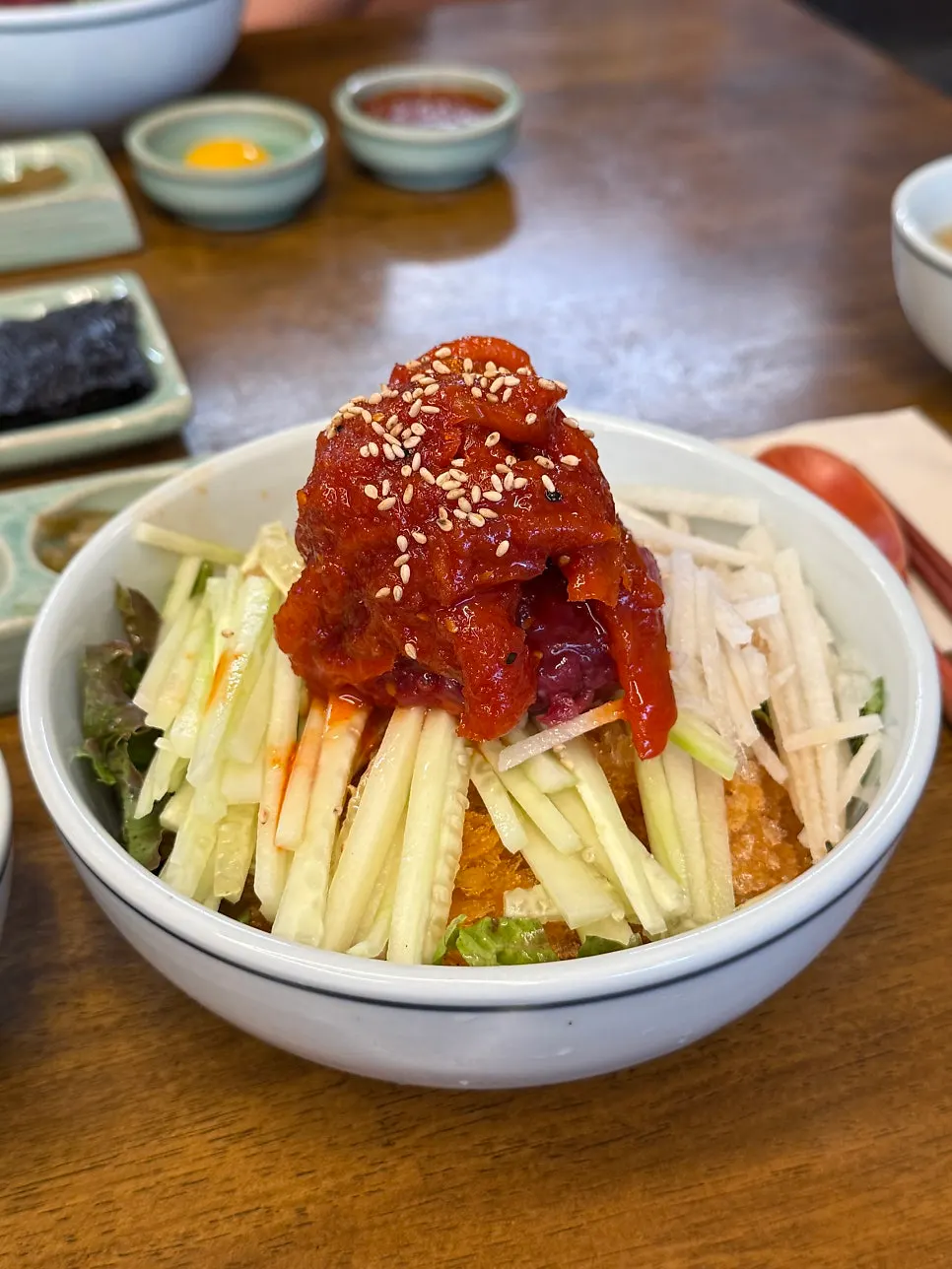 Yukhoe bibimbap wrapped in gopchang gim
